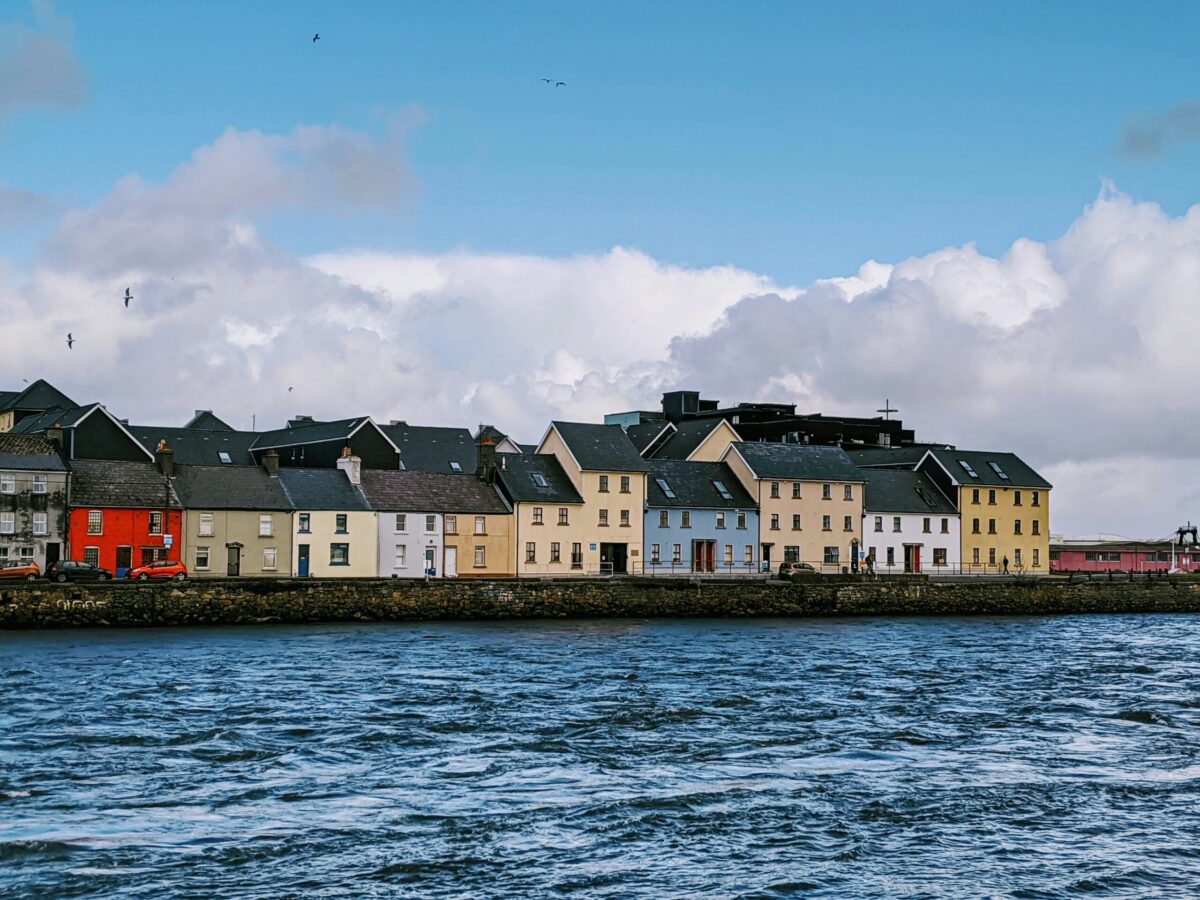Galway Ireland colorful waterfront houses Claddagh for American remote workers relocating