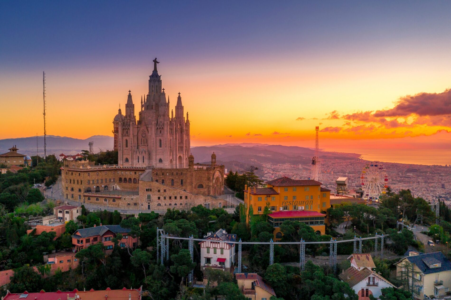 Barcelona Spain skyline at sunset - top destination for American expats relocating from USA to Spain